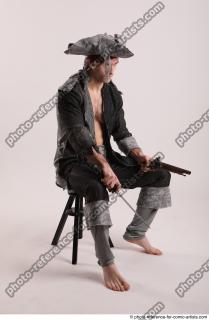JACK PIRATE SITTING POSE WITH GUN AND DAGGER